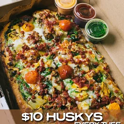 $10 Pizza Tuesdays at Slim + Husky’s