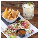 Two chicken tinga tacos & chips and salsa – $10