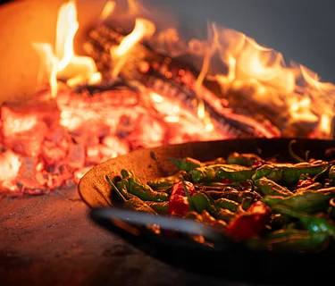 “Kissed By Fire” an Artisanal Wood-fired Farm to Table & Wine Pairing Experience
