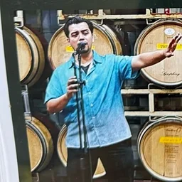 Wine Down & Turn Up: Karaoke, Wine Specials, and Pizza at Lusso Della Terra