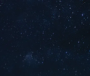 Our Understanding of the Cosmos—Then and Now